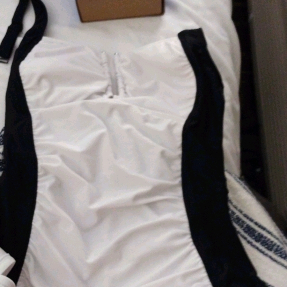 Three piece bathing suit with cover up pants